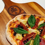 Pizza on wood peel